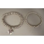 Two Links of London silver bracelets, on elasticated straps, in one box