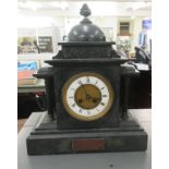 An Edwardian black slate cased mantel clock, faced by a Roman dial  16"h