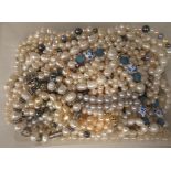 Pearl and simulated pearl jewellery, mainly necklaces