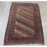A Kazak rug, decorated with angled, stylised decoration, on a multi-coloured ground  46" x 70"