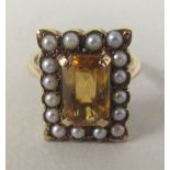 A 9ct gold citrine and seed pearl set dress ring