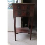 An Edwardian string inlaid mahogany bedside cabinet with three drawers, raised on square, tapered