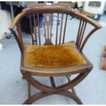 A 19thC and later walnut and beech framed, splat and spindle back elbow chair, the old gold coloured