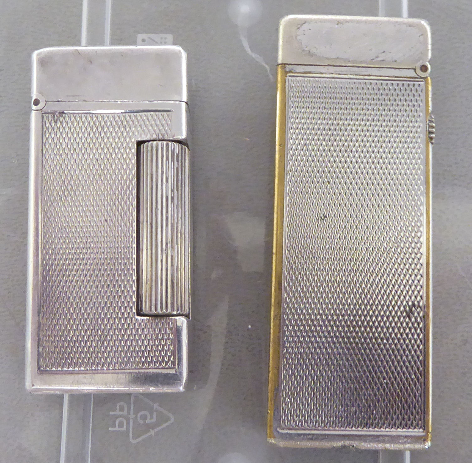 Two vintage Dunhill silver plated cigarette lighters