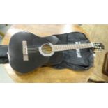 A Stretton Payne six string accoustic guitar, model no. SP34LMBK  bears a label, in a sleeve