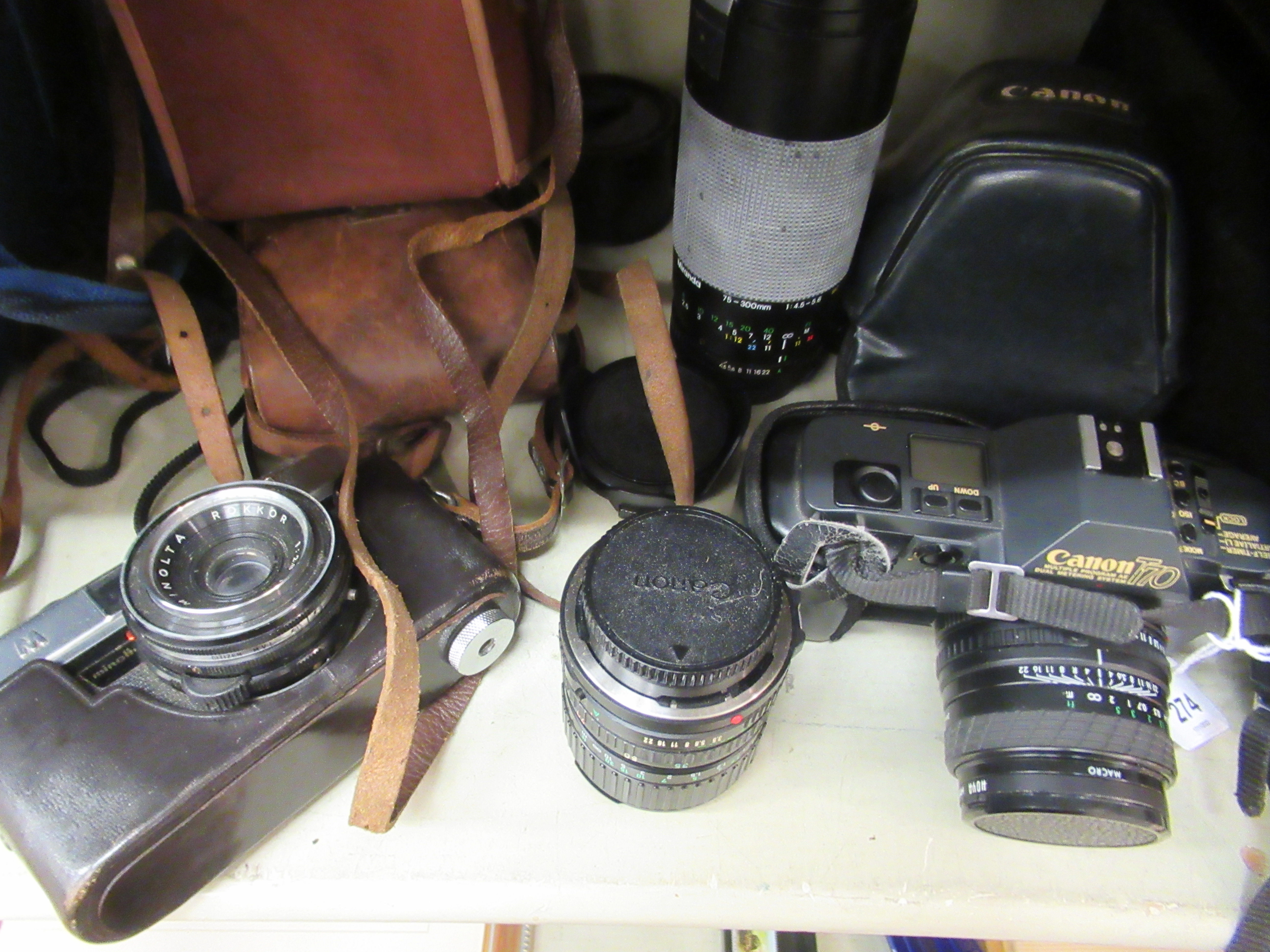 Photographic equipment: to include a Miranda 75-300mm lens; and a Canon T70 camera - Image 2 of 2