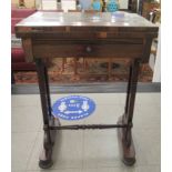 A Regency rosewood card table, the rotating foldover top over a frieze drawer, raised on fret carved