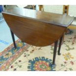 A George III mahogany drop leaf table, raised on turned legs and pad feet  28"h  39"w