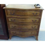 A mid 19thC mahogany serpentine front, four drawer dressing chest, raised on bracket feet  34.5"h