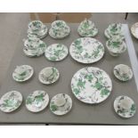 Shelley china tea/coffee ware, decorated with green leaves  bears a printed label for Sorne & Smith,