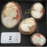 Two cameo brooches, set in 9ct gold frames; and two others in base metal mounts