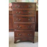 An early/mid 20thC mahogany five drawer tallboy, raised on bracket feet  41"h  22"w