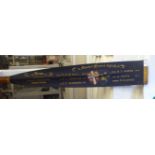 An Edwardian oar, the painted and gilded paddle inscribed 'Clinker Fours, 1910'  145"L overall