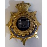 A Dorsetshire Regiment military helmet plate  (Please Note: this lot is subject to the statement