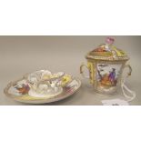 A 19thC Augustus Rex style gilded porcelain twin handled chocolate cup and saucer, decorated with