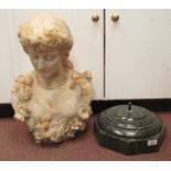 A late 19thC, probably French, carved alabaster bust, a young woman in pensive pose, on a turned,
