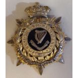 A Connaught Rangers military helmet plate  (Please Note: this lot is subject to the statement made