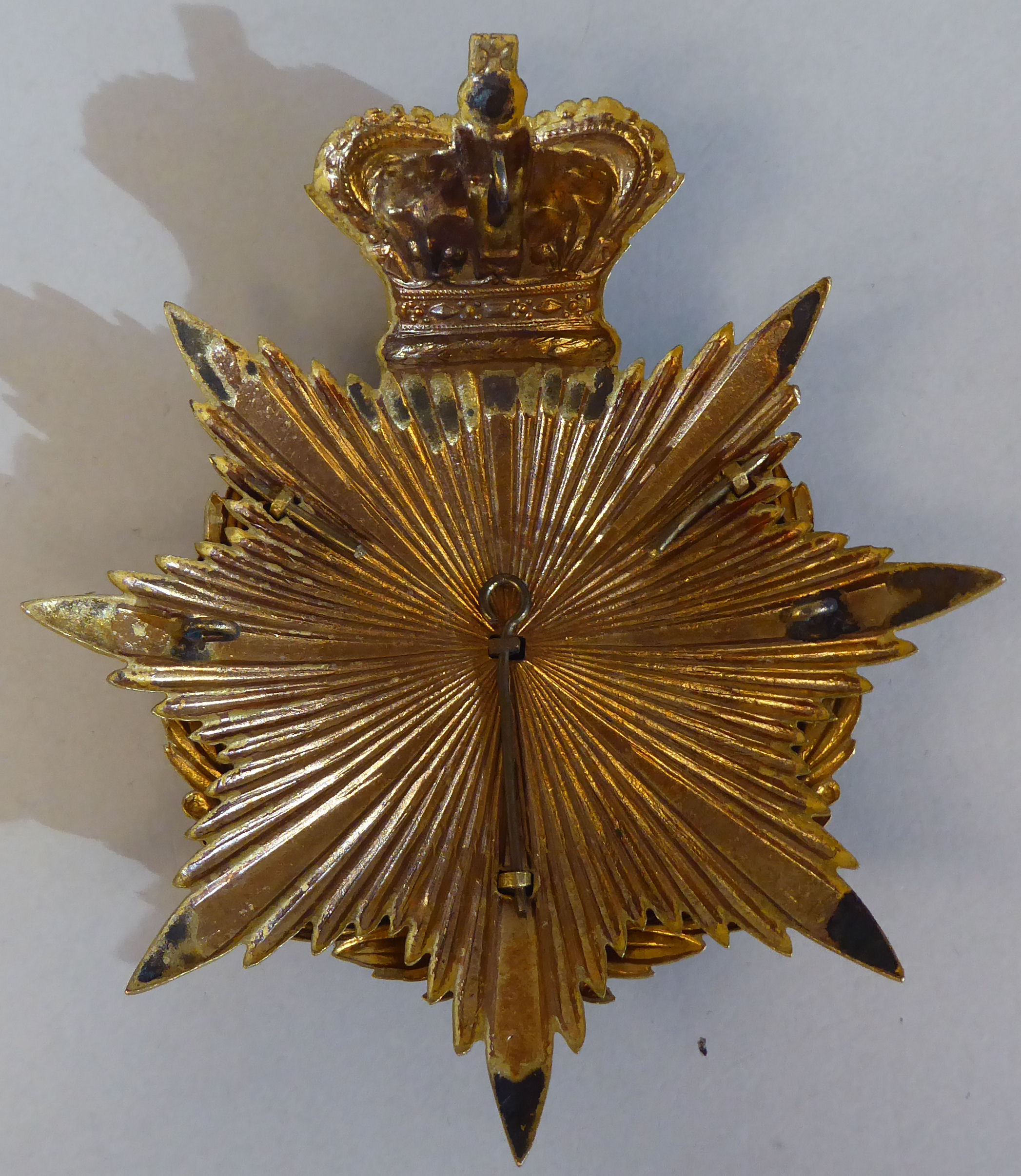 A Dorsetshire Regiment military helmet plate  (Please Note: this lot is subject to the statement - Image 3 of 3