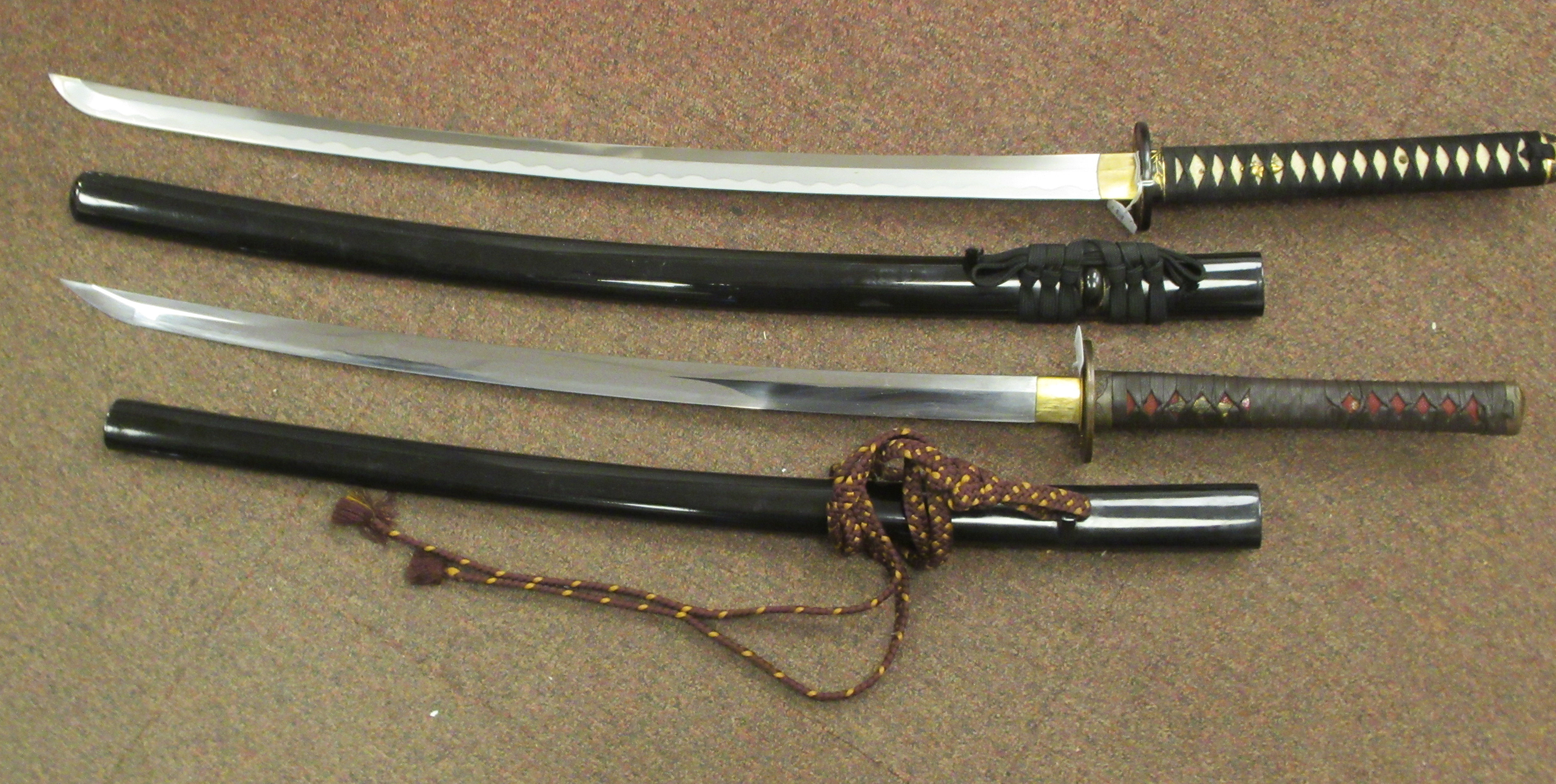 Two similar 20thC Japanese swords with woven fabric bound handles and tsuba, the curved, stainless - Image 2 of 8