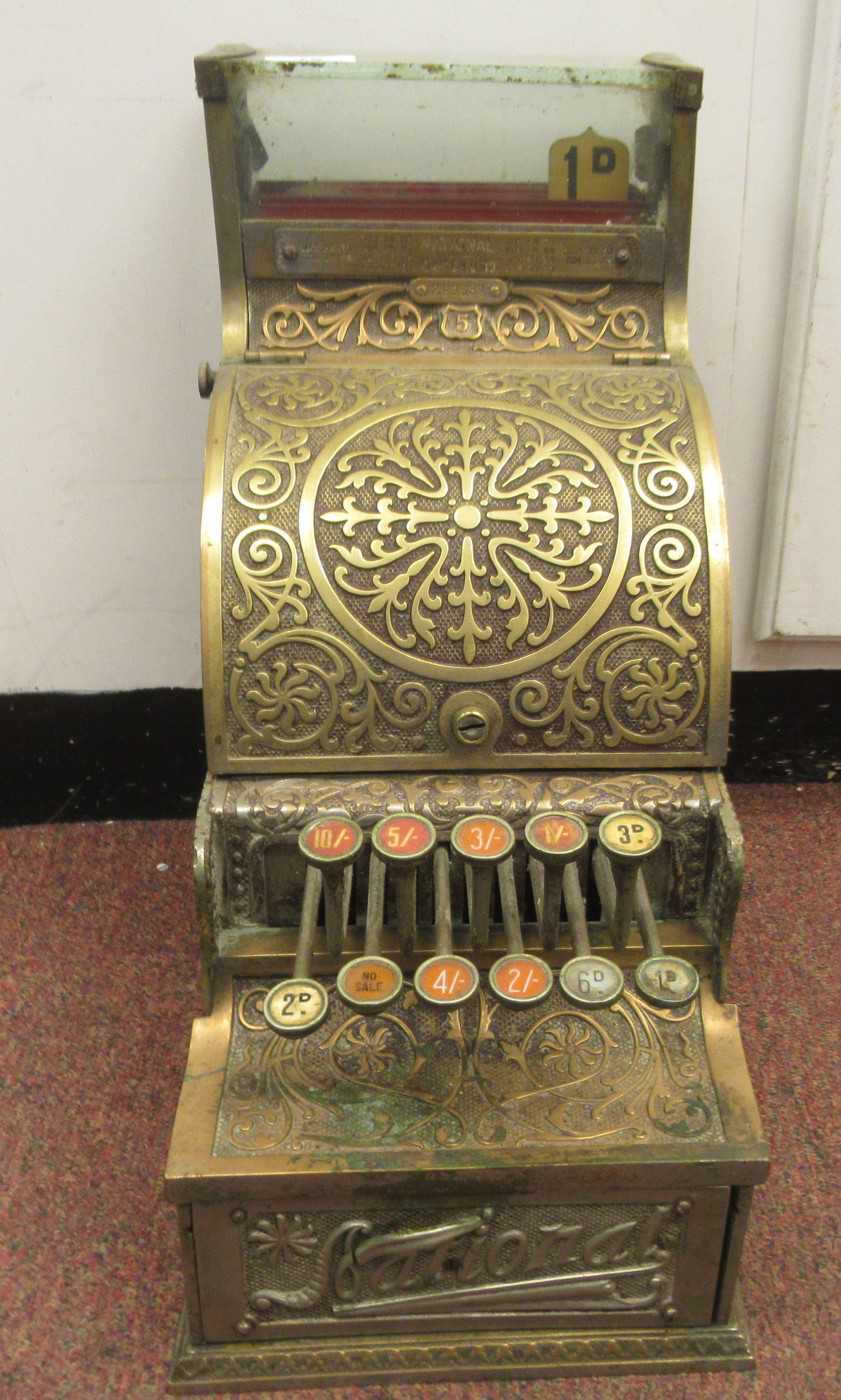 A late 19thC National of Daytan, Ohio cast brass No.5 cash register with a lockable hinged cover,