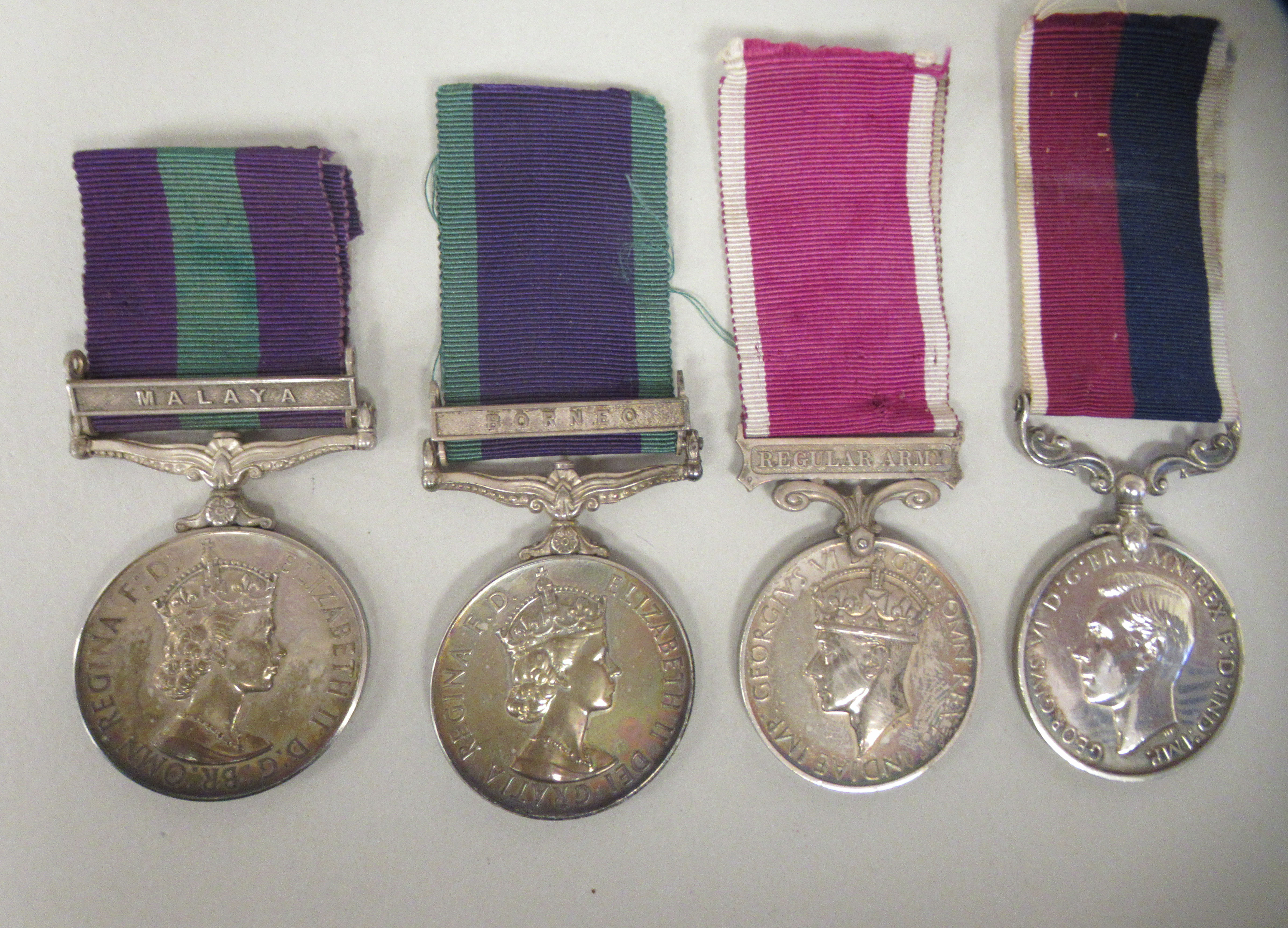 A King George VI Regular Army medal for Long Service and Good Conduct and ribbon; inscribed