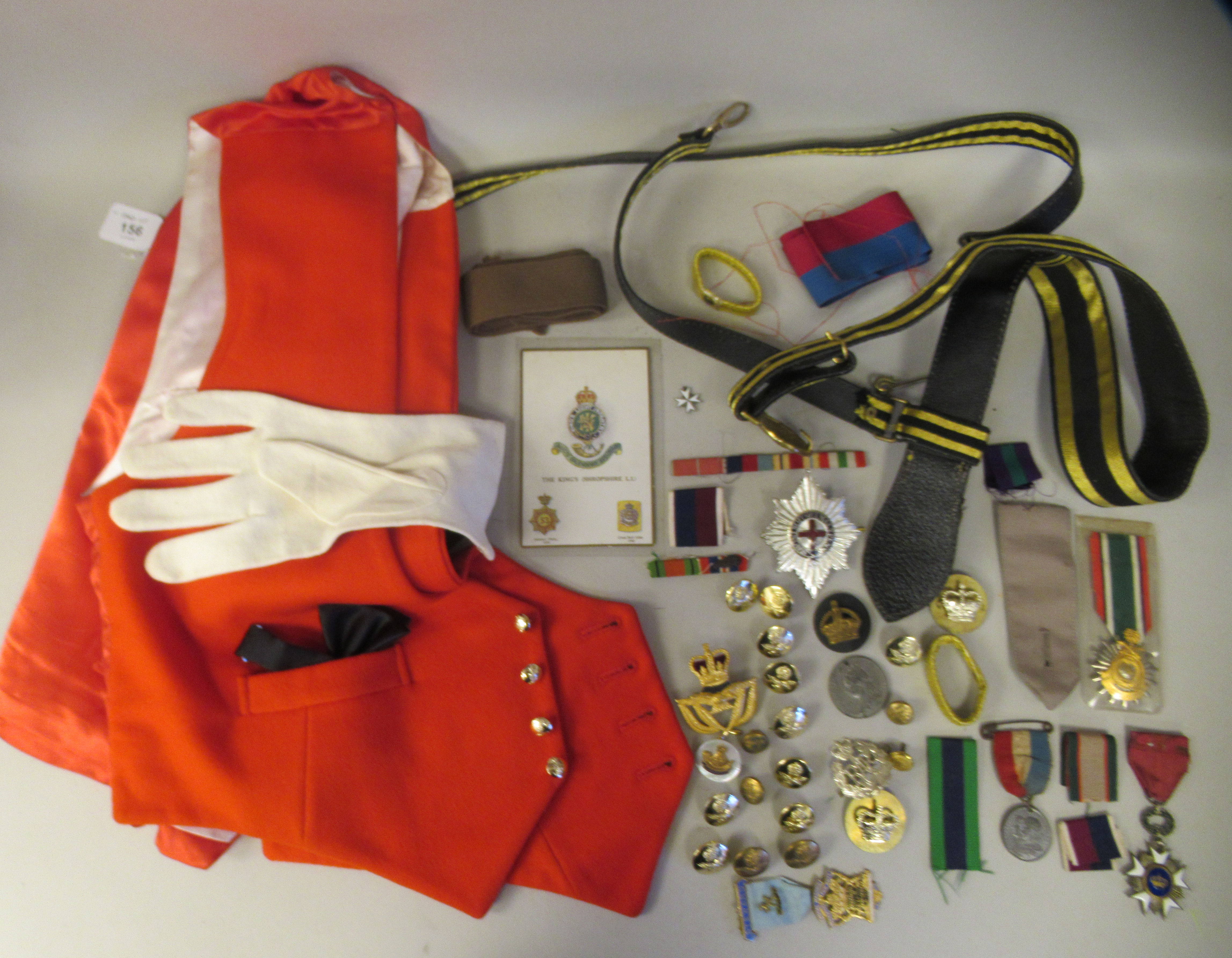 Miscellaneous militaria: to include two mess uniform waistcoats; and assorted badges  (Please