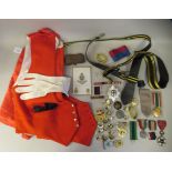 Miscellaneous militaria: to include two mess uniform waistcoats; and assorted badges  (Please