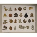 Twenty-six military cap badges and other insignia, some copies: to include Lancashire Fusiliers; 3rd