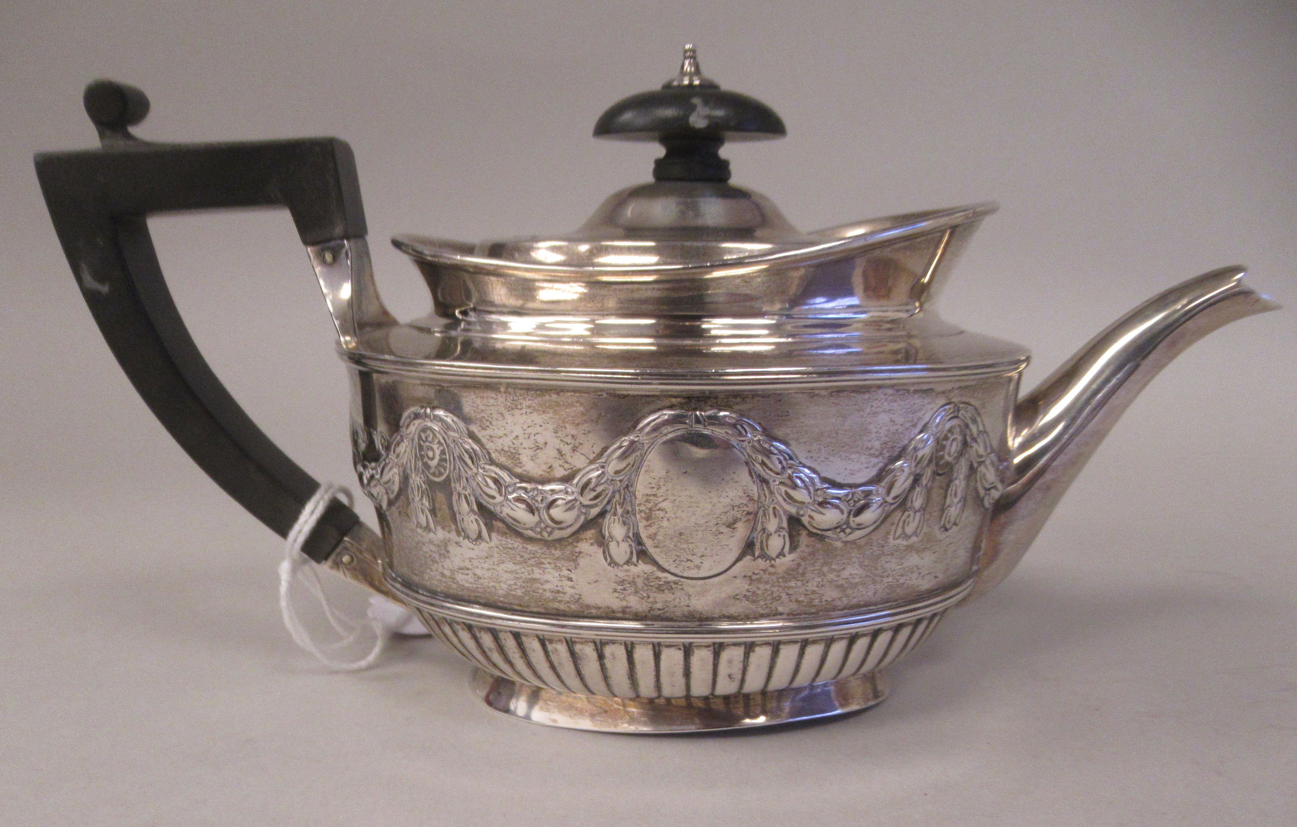 A late Victorian silver batchelors oval teapot with embossed garlands, drapes and demi-reeded - Image 3 of 8