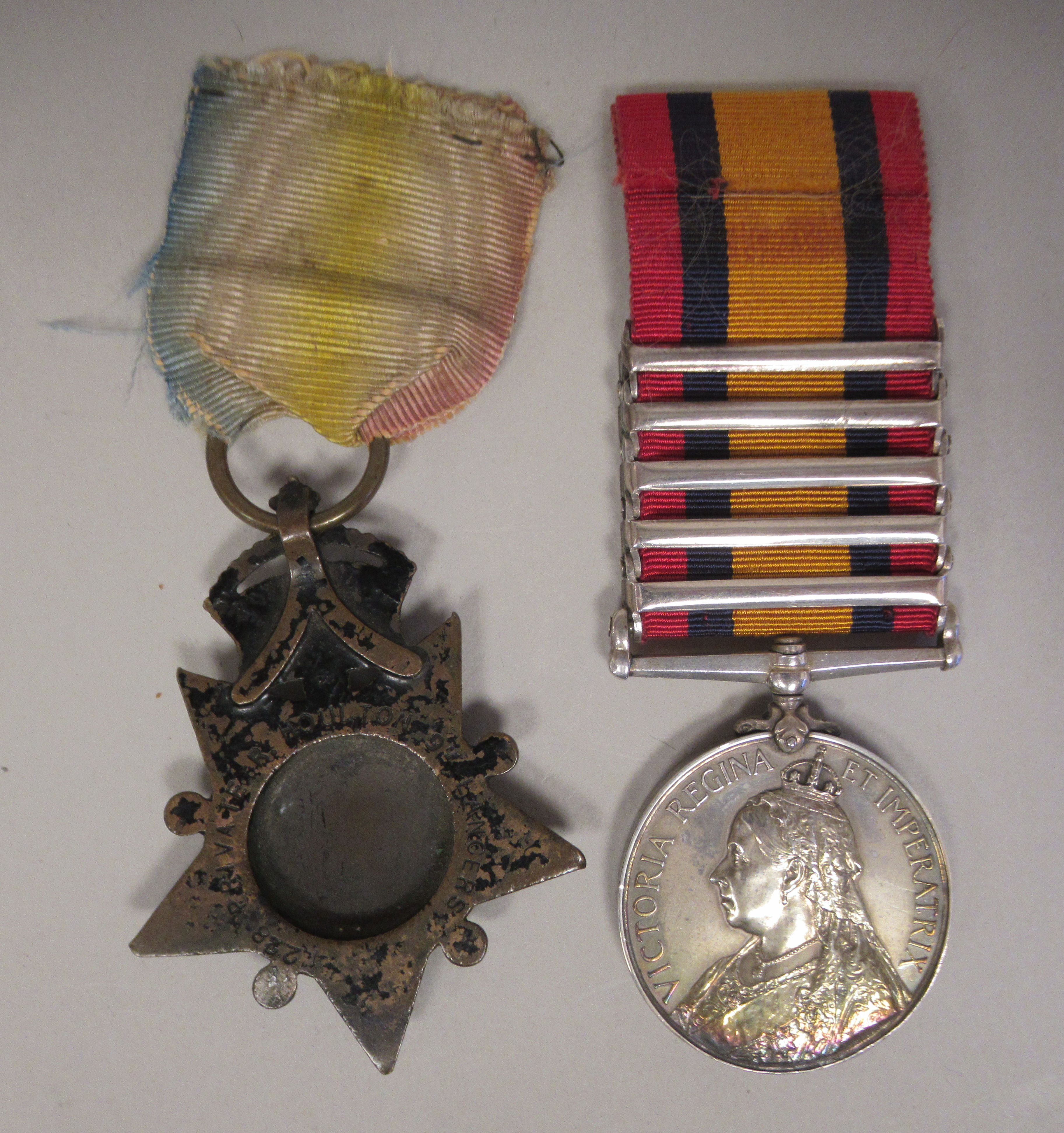 A Victoria South Africa medal, the monarch's profile portrait on the obverse with five bars on the - Image 2 of 3