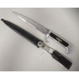 An Italian Fascist era, political officer's dress dagger with an aluminium black celluloid handle