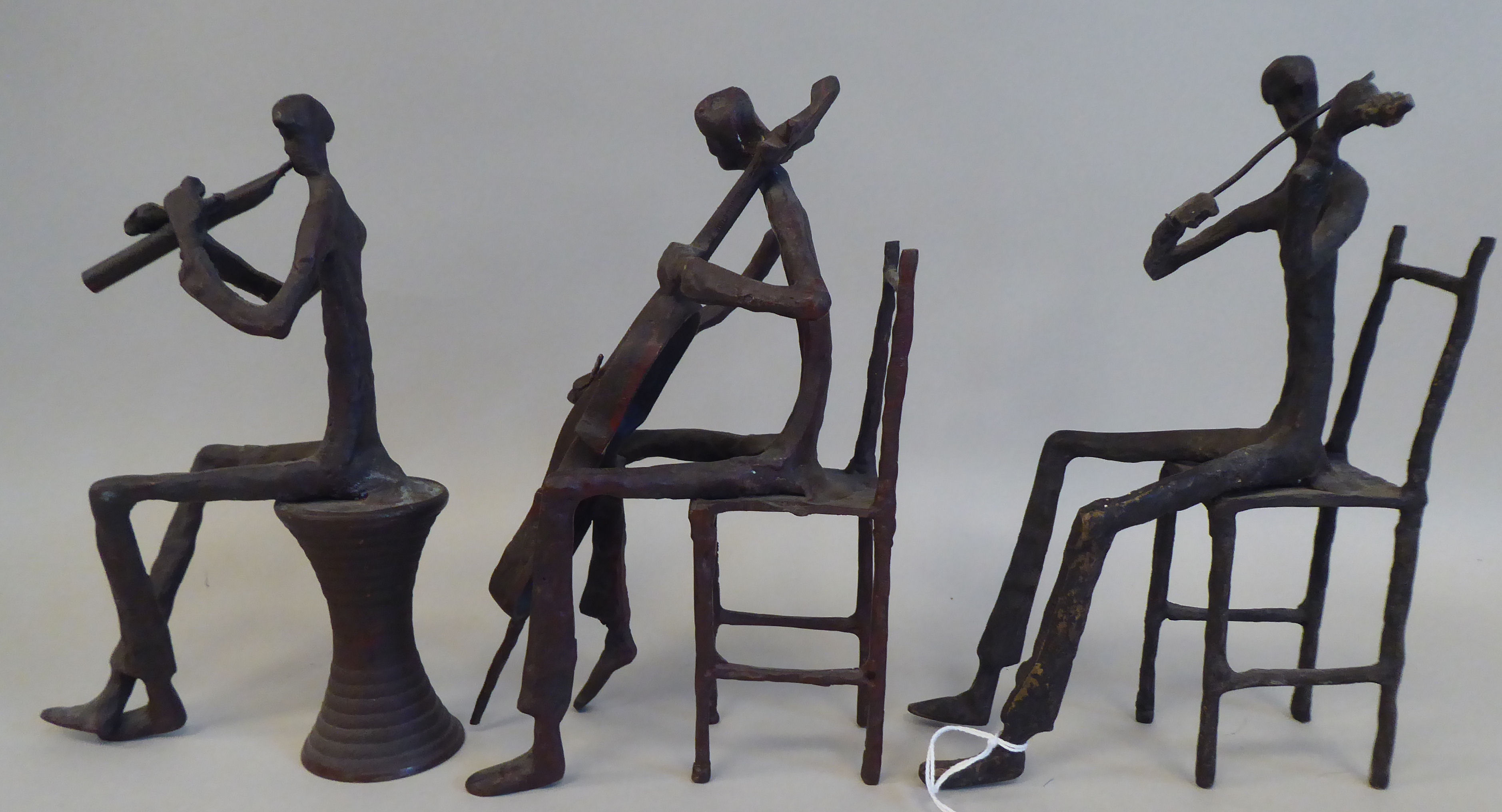 In the manner of Giacometti - a series of three painted bronze sculptures, featuring seated jazz - Image 4 of 7
