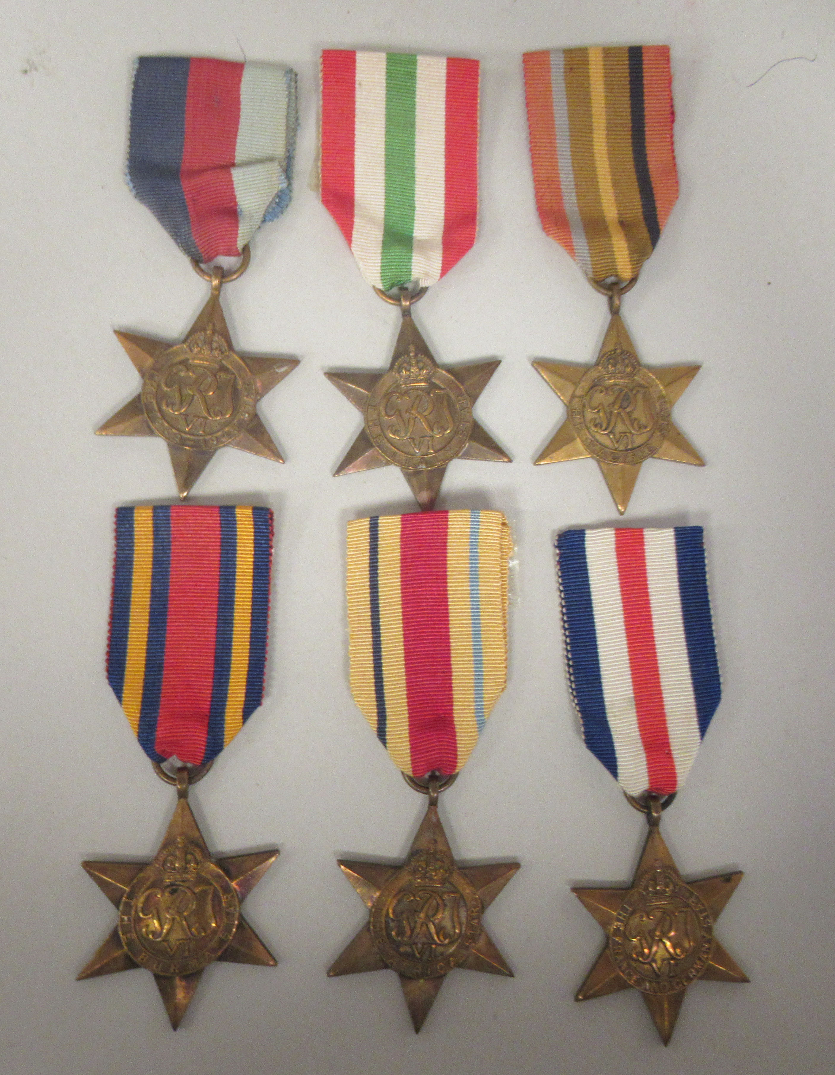 Six Second World War Stars on ribbons for The Pacific, Burma, France and Germany 1939-1945, Africa
