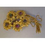 An 18ct textured gold floral brooch, set with coloured stones