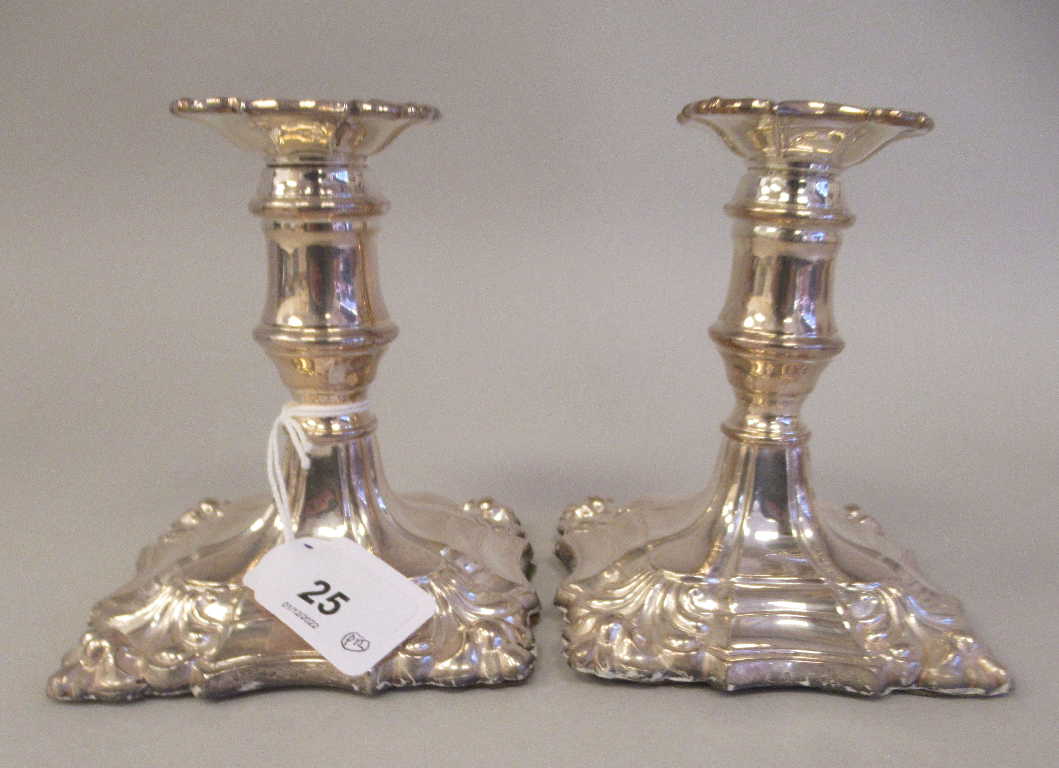 A pair of 18/19thC style loaded silver dwarf candlesticks, each with a detachable sconce and vase