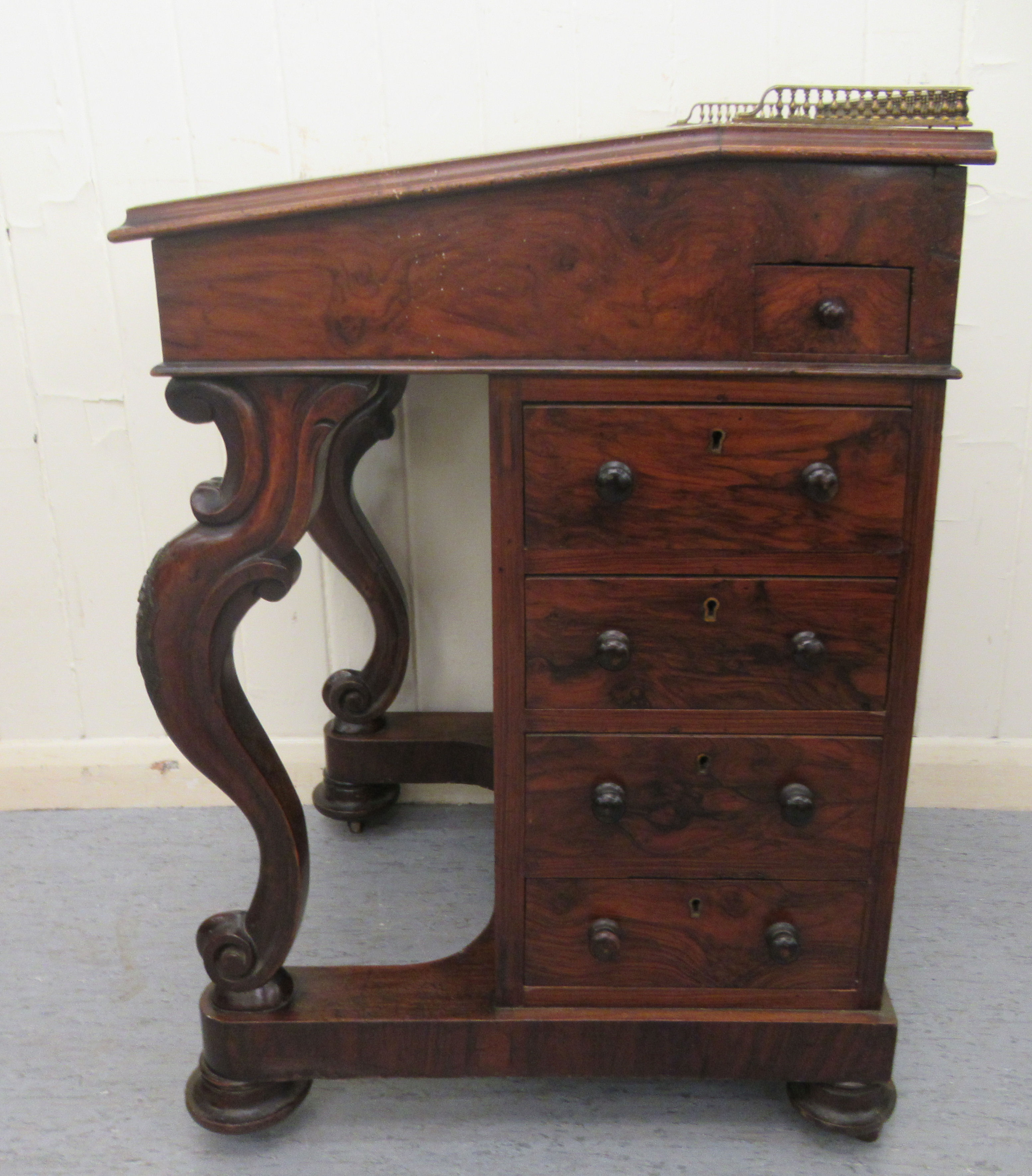 A mid Victorian walnut Davenport with a brass galleried top and an angled, hinged, tooled green hide - Image 2 of 8