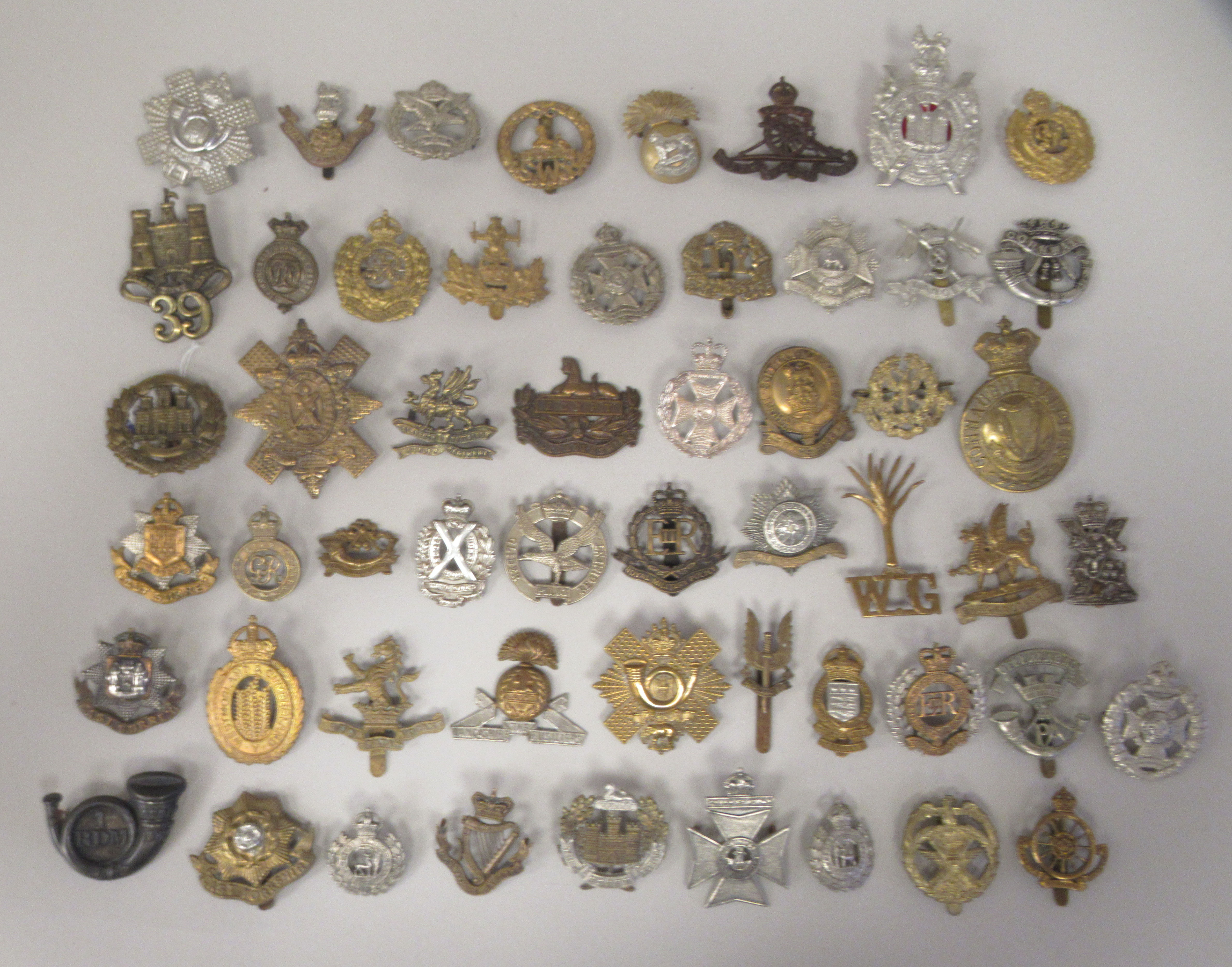 Approx. fifty military cap badges and other insignia, some copies: to include The Glider Pilot