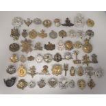 Approx. fifty military cap badges and other insignia, some copies: to include The Glider Pilot