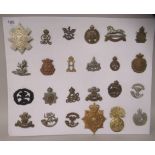 Twenty-four military cap badges and other insignia, some copies: to include Reconnaissance Corps;