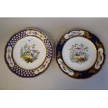 Two similar 19thC Serves porcelain plates, decorated to the centres and border vignettes with