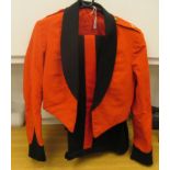A British Army mess jacket and trousers with uniform pips  (Please Note: this lot is subject to