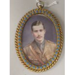 An early 20thC oval head and shoulders portrait miniature, a young uniformed British Army officer