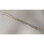 A silver presentation pickle fork, on a flattened stem  FH  London 1977