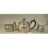 A late Victorian silver batchelors three piece tea set of oval ogee form, comprising a teapot with