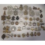 Approx. fifty military cap badges and other insignia, some copies: to include 4th Queen's Own