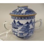 A late 18thC Chinese porcelain twin handled cup and cover, decorated in blue and white with figures,