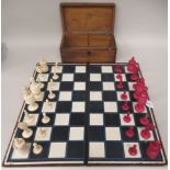 A mid 19thC turned naturally coloured and beetlenut stained Barleycorn pattern chess set  the