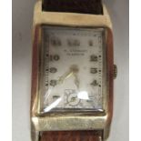 A 9ct gold cased wristwatch, the 15 jewel movement faced by an Arabic dial, inscribed R Stewart of
