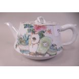 A late 19th/early 20thC Chinese porcelain circular teapot with a short, angled spout, loop handle