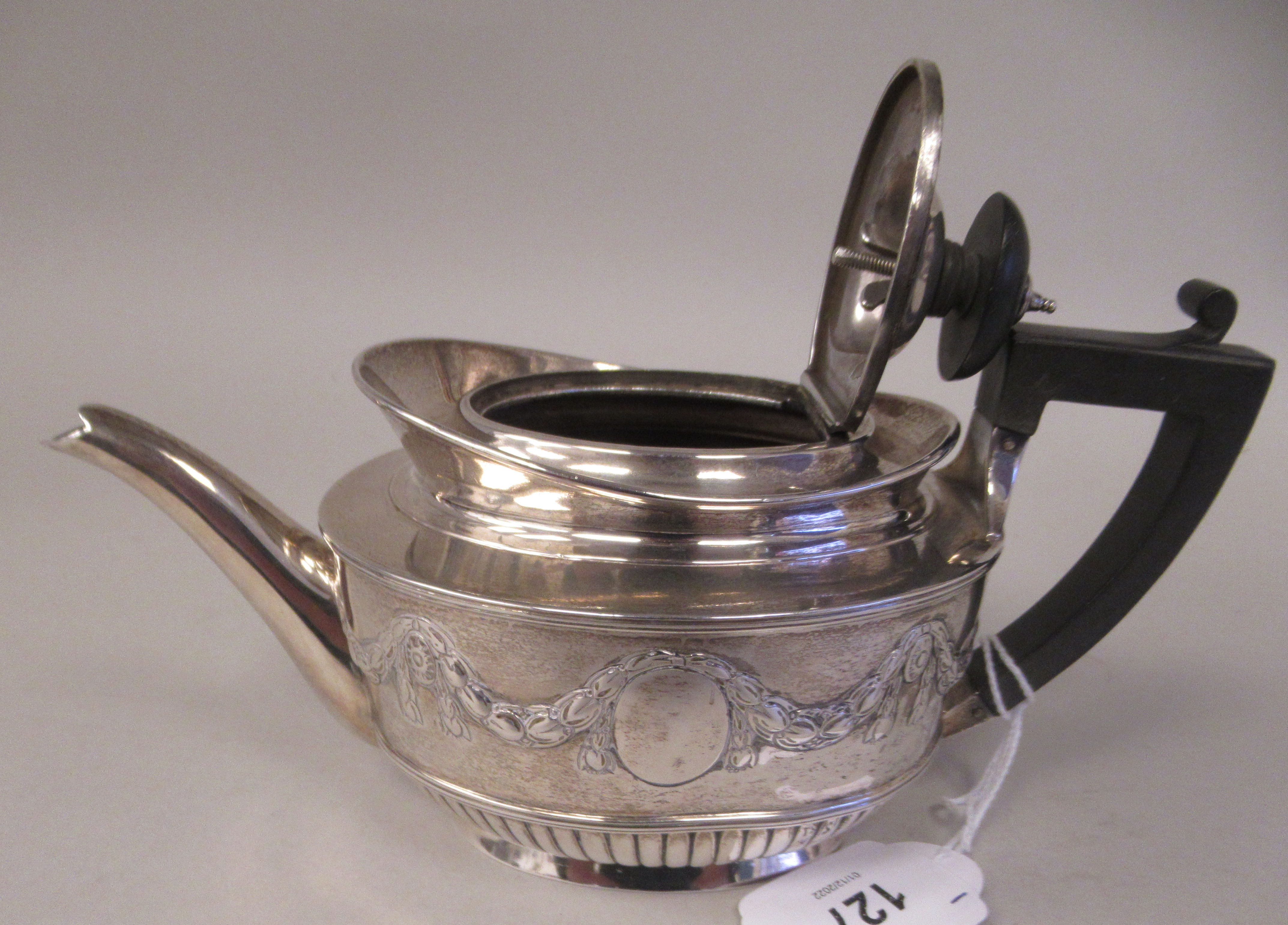 A late Victorian silver batchelors oval teapot with embossed garlands, drapes and demi-reeded - Image 6 of 8